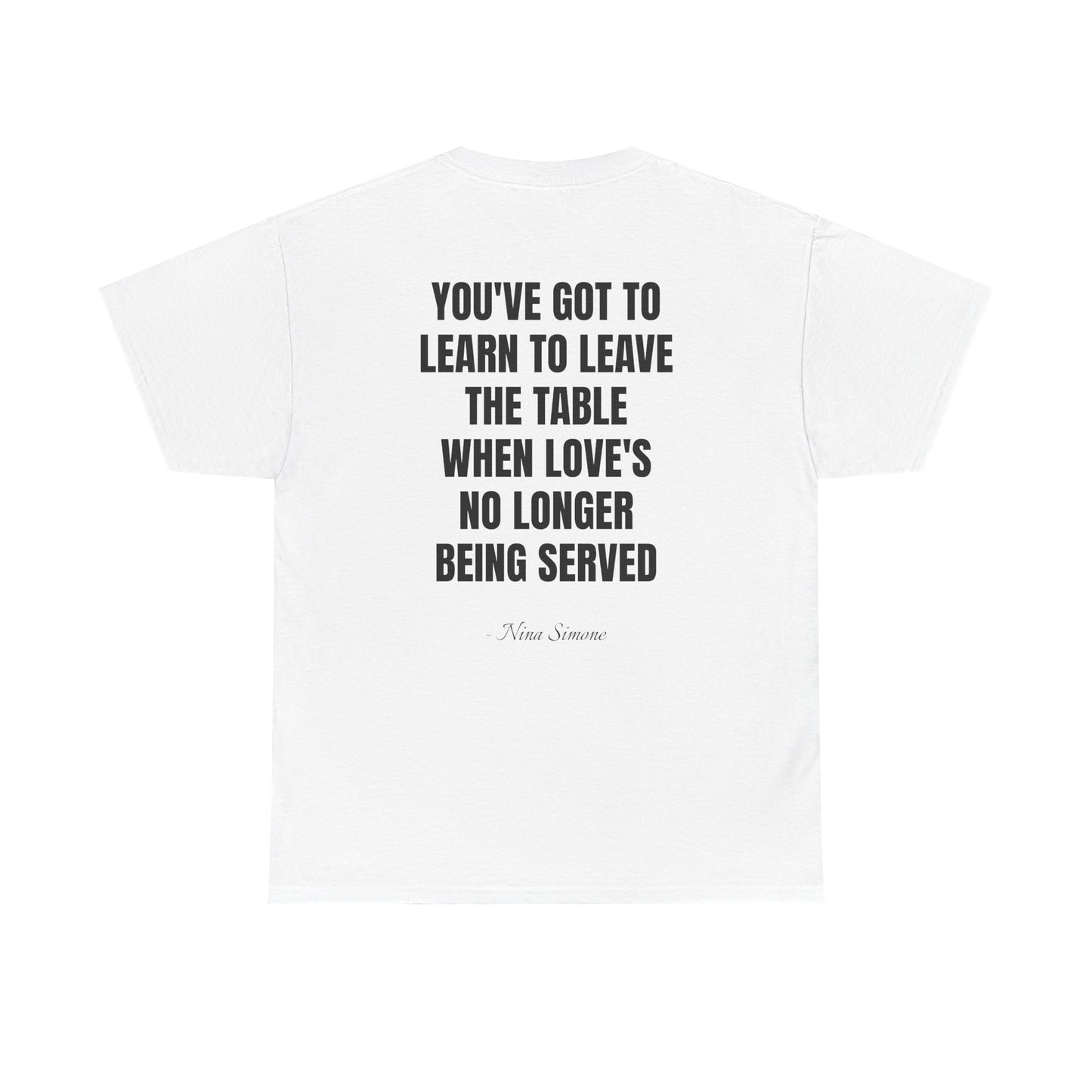 White t-shirt with black text quote on a white background